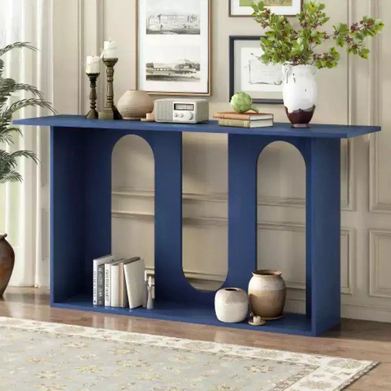 Consolle dal design curvo moderno blu con ripiano aperto, consolle eleganti per ingresso o soggiorno, come mobile contenitore o espositivo