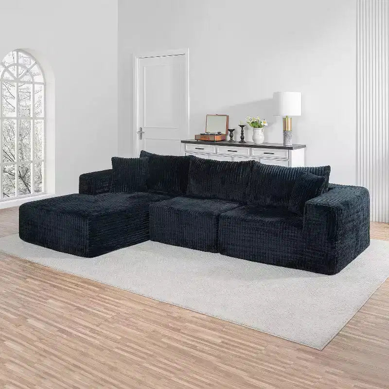Divano componibile modulare Cloud 110 con chaise longue, divano a L con seduta profonda, divano componibile senza telaio rivestito in morbido velluto a coste